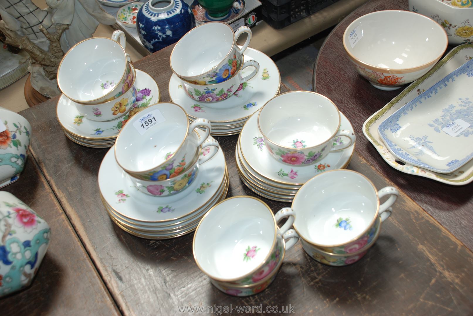 A Dresden part Teaset, with pretty floral hand painted decoration, comprising 11 cups, - Image 2 of 5