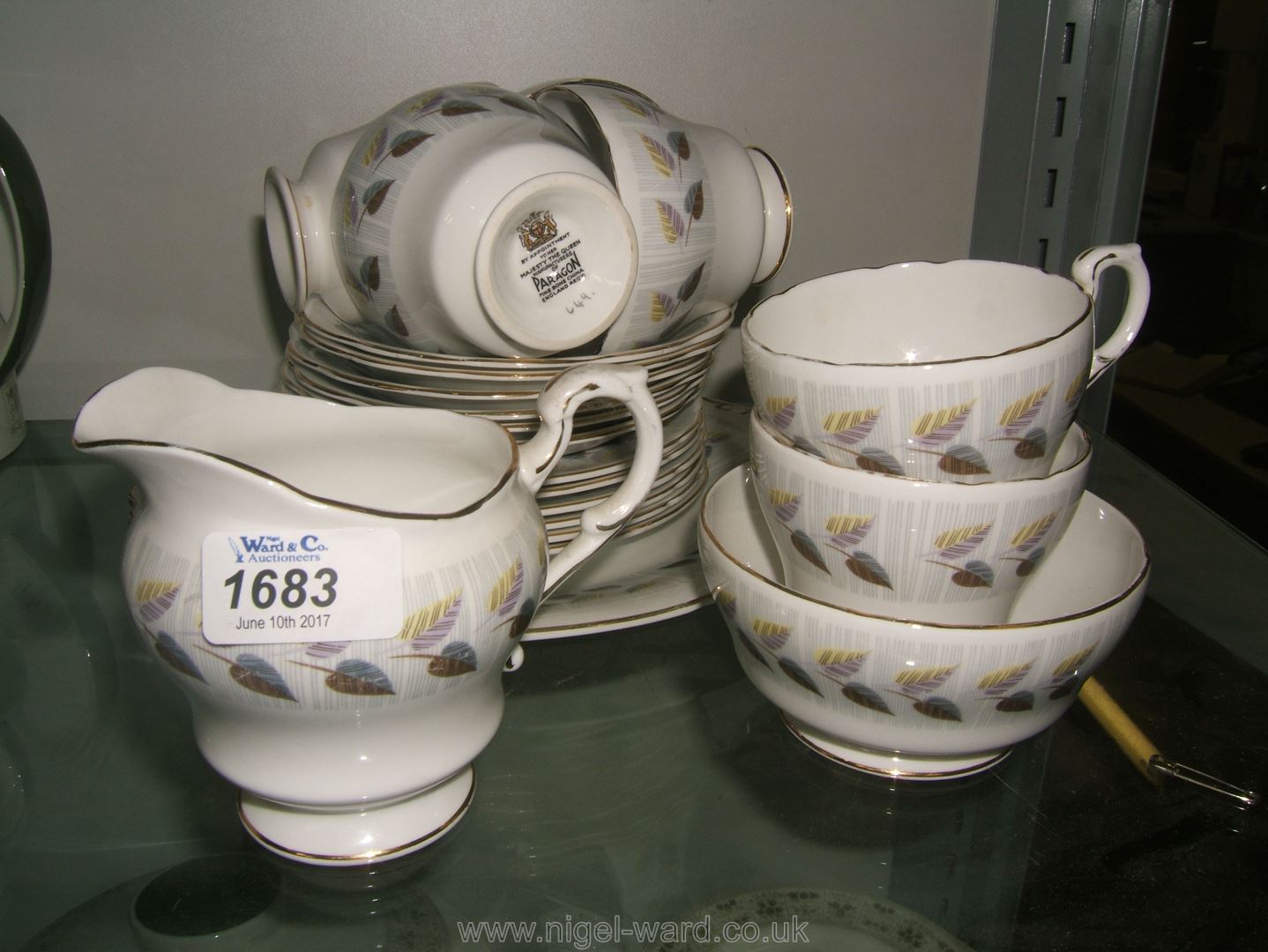 A Paragon Teaset with leaf design, including six cups, saucers and tea plates, sugar bowl,