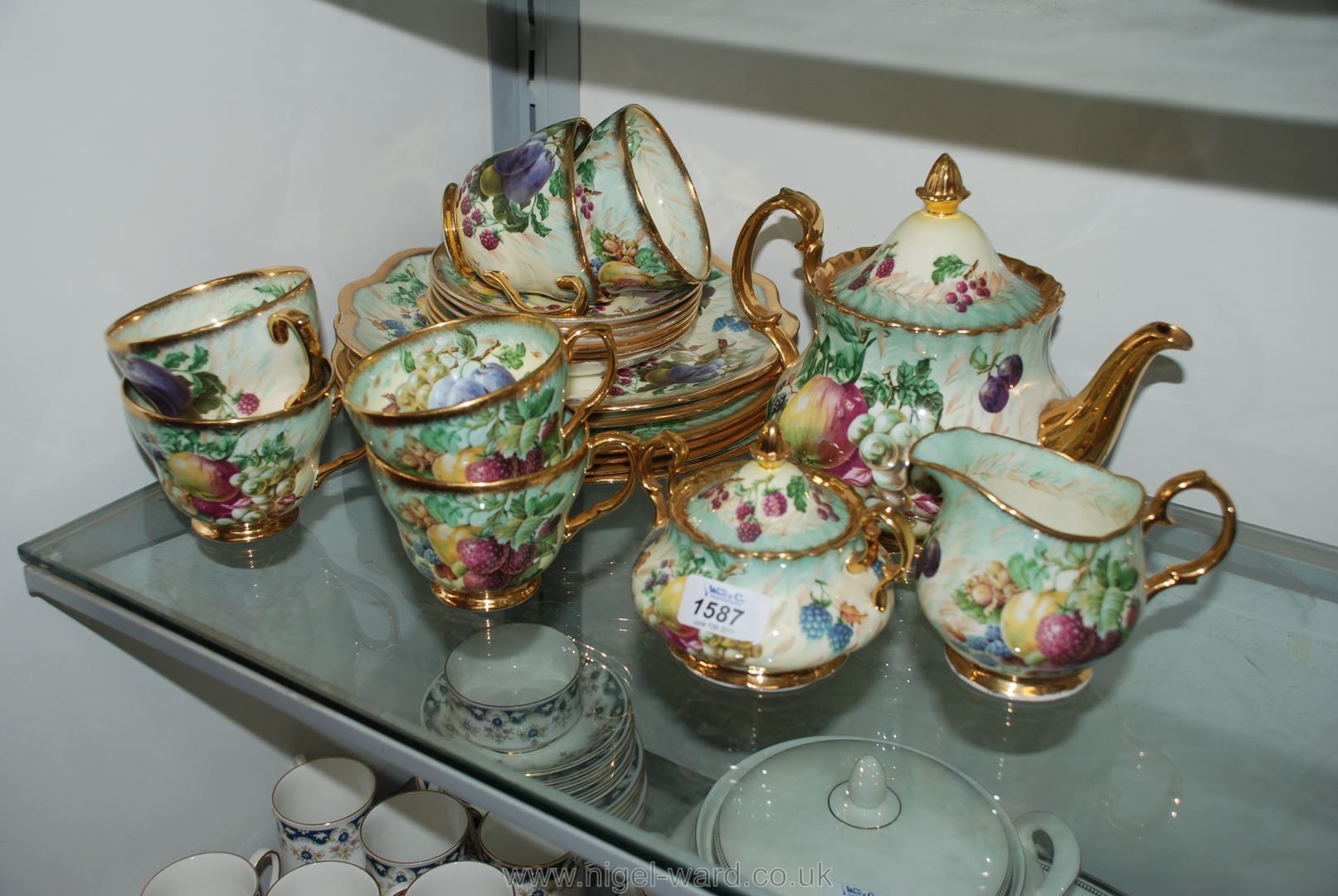 A Raymond Everill 'Princess Royal' Tea Service, fruit decorated, including teapot, sugar bowl, - Image 2 of 7