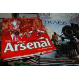 A Box of Books including three books on Trains and four books on Arsenal Football Club