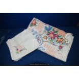 A vintage large embroidered tablecloth, 60" wide,