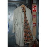 A Burberry Mackintosh with detachable pure wool lining,