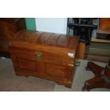 A small wooden Travel Trunk