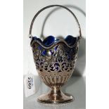 A pierced Silver Sugar Basket with blue liner,