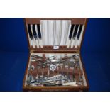 A cutlery box with mixed cutlery