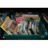 A box of books inc novels, trees, motorcycles, natural wonders,