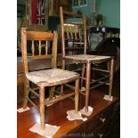 An Arts and Crafts Beech spindle back rush seat Bedroom Chair along with a similar child's chair.