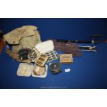 A Fishing Bag and contents including fly reels by Sharpes of Aberdeen,