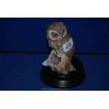 A Kaiser bisque model of an Owl, hand-painted signed W.