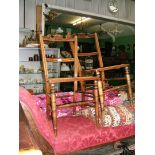 A pair of Edwardian cane seated Mahogany Bedroom Chairs having architectural style top rail with