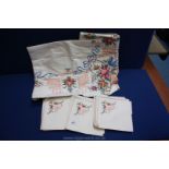 A vintage large embroidered tablecloth, 60" wide,