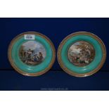 Two good Prattware pottery plates printed rural scenes against green backgrounds,