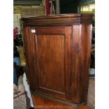 A Mahogany wall hanging Corner Cabinet,