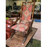 A Beech frame American Rocking Chair of spindle turned construction