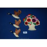 A Set of three wall mounted Canadian Geese (made in England) and an Anemone wall Pocket