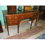 An Edwardian, Georgian style Mahogany bow fronted Sideboard with inlaid top,