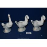 Two Nao (by Lladro) Swan figures plus a similar Duck figure