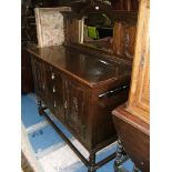 A 1940's Oak mirrorback Sideboard on barley twist legs