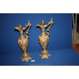 A pair of gilt finished reproduction Lamps in the form of classical wine jugs