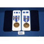 Two Nato Service Medals one with bar 'ISAF' and other with bar 'non-article 5' both boxed with