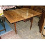 A Georgian Mahogany drop leaf, swing leg Dining Table with plain edged rectangular top,