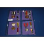 Four various Medals including a Service Medal of the order of St.