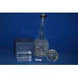 A glass Decanter with white metal rim (no stopper) and two Paperweights,