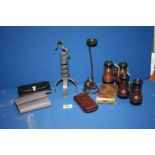 A leather cigar case, boxed Post Office savings bank and various purses, spiral candlestick,