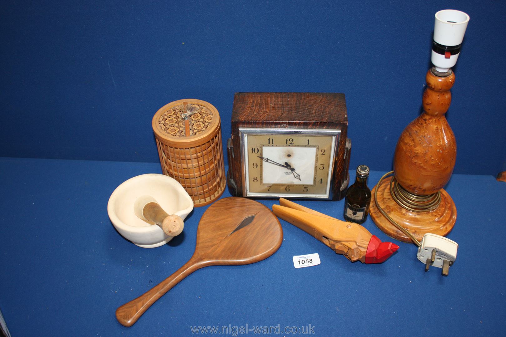 A small quantity of miscellanea including Smiths mantle Clock, coasters, hand mirror, table lamp,