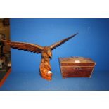 A carved wooden Eagle and a Tea Caddy, a/f.