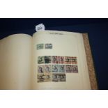 A green Simplex Stamp Album, British Empire and Commonwealth mix QV - QEII,