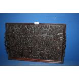 An Indian hand carved wooden Tray decorated with Elephants and entertainers including snake