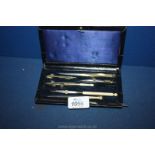 A cased brass and ivory Drawing set.