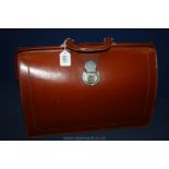 A tan Leather Briefcase