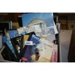 A box of books and DVD's incl The Case of Lascaux, Windows 7,