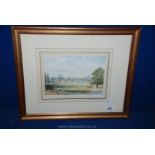 A framed and mounted Watercolour depicting countryside landscape with a river,
