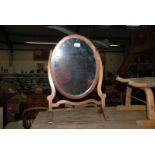 An oval Dressing Table Swing Mirror