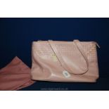 A pink Radley Handbag in a Radley dust bag