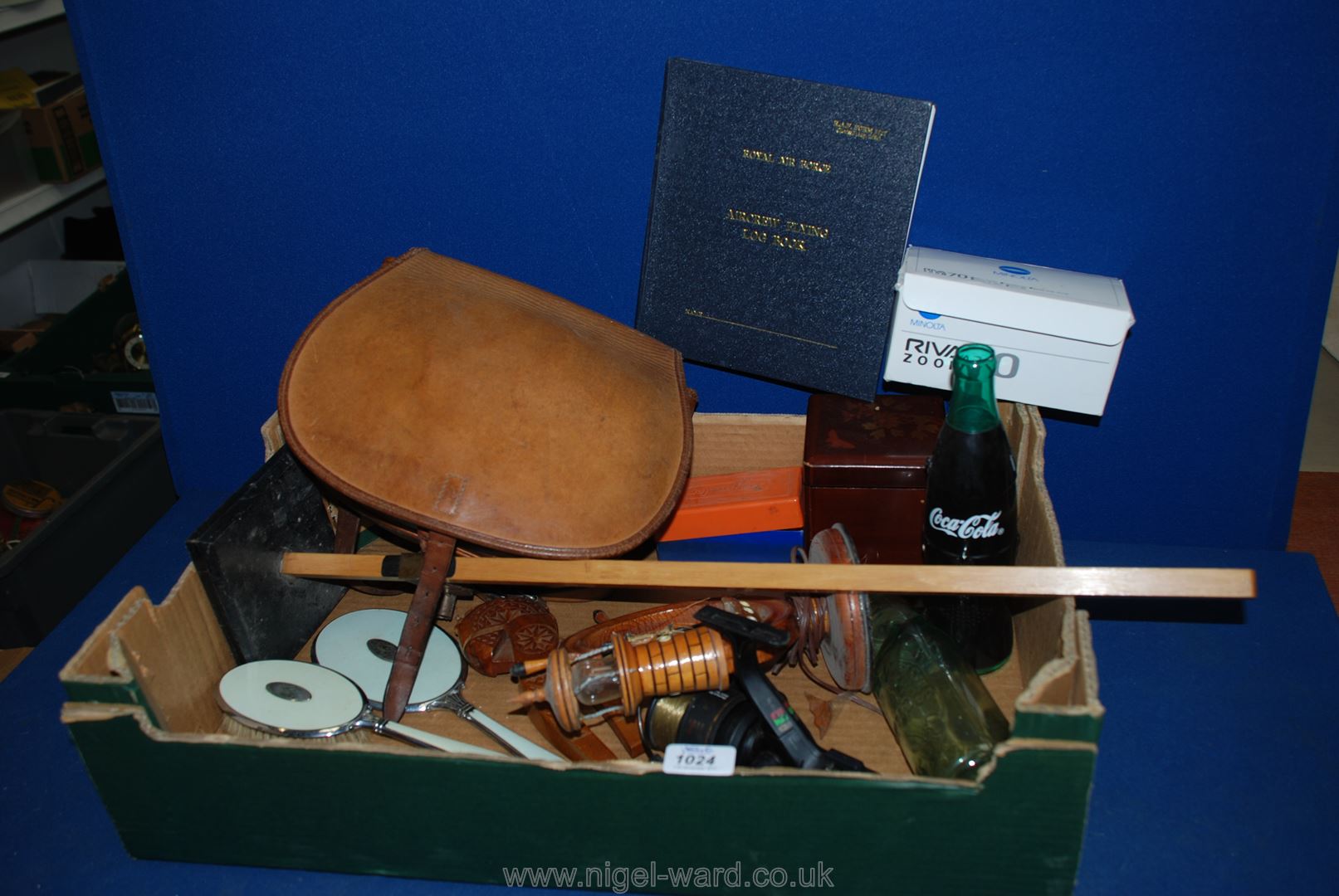 A quantity of miscellanea including cartridge bag, measuring stick, Minolta camera, slides,