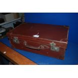 A large Leather Suitcase,