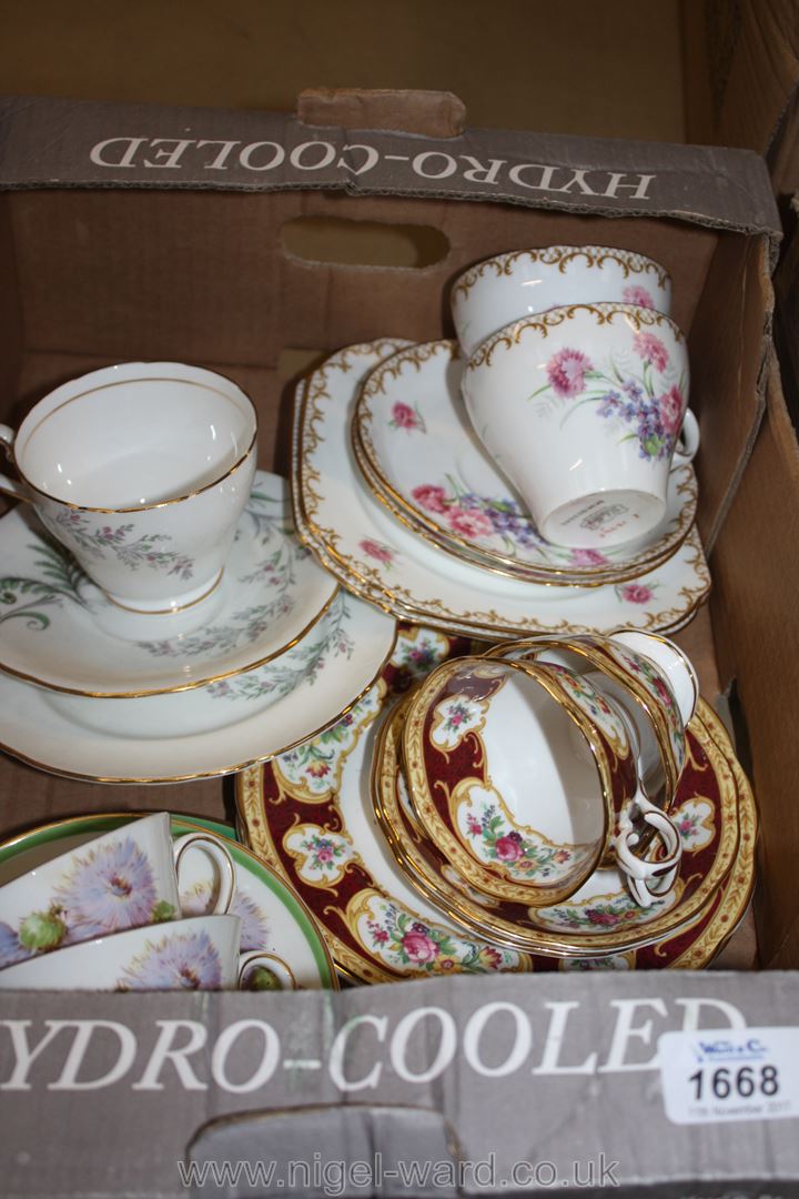 A quantity of Trios including Royal Albert, Shelley, Aynsley, Doulton, etc.