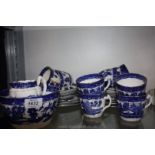A Clifton china 'Willow' pattern part Teaset including seven plates, eight cups and saucers,