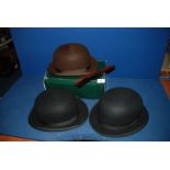One brown and two black Bowler Hats in good condition, probably size 7 1/4,