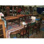 A good Georgian Mahogany double 'D' end extending Dining Table, the 'D' ends having strung frieze,