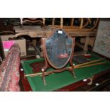 A shield shaped Dressing Mirror