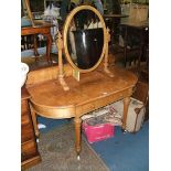 An elegant Victorian satinwood Dressing Table with oval mirror in fluted turned supports,
