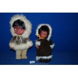 Two vintage Eskimo Dolls with original fur and leather