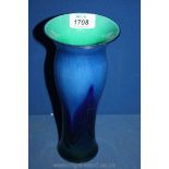 A Studio Art glass Vase in blue with pulled feather loop iridescent (chip to lip),