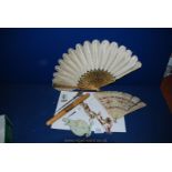 A carved and painted bone Fan, needle case, silver handled button hooks, etc.