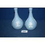 A pair of Wedgwood blue Jasperware bud Vases.